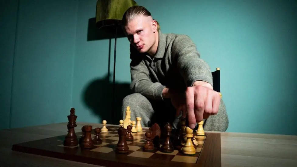 Large audience watching a professional chess tournament